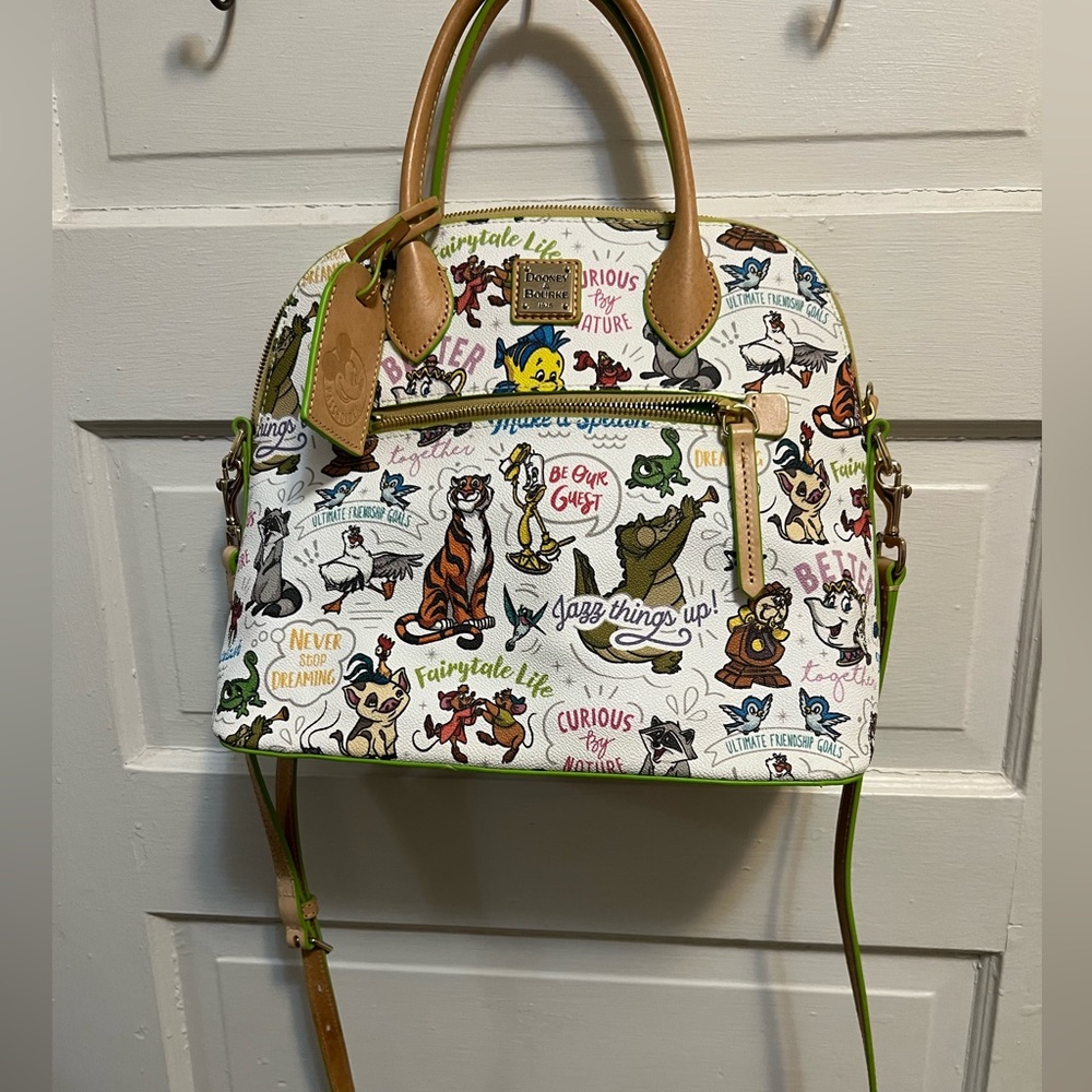 Disney Dooney and Bourke limited addition 
Sidekick Satchel NWOT